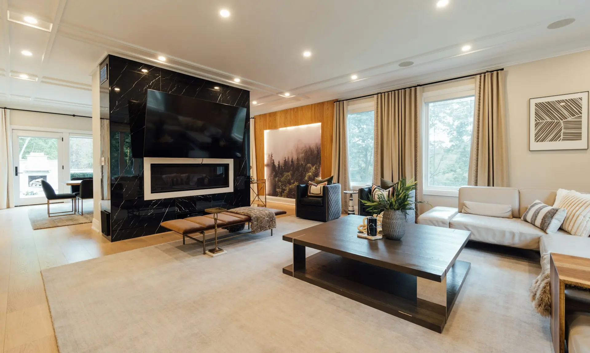 Living room with wood flooring and finished trim